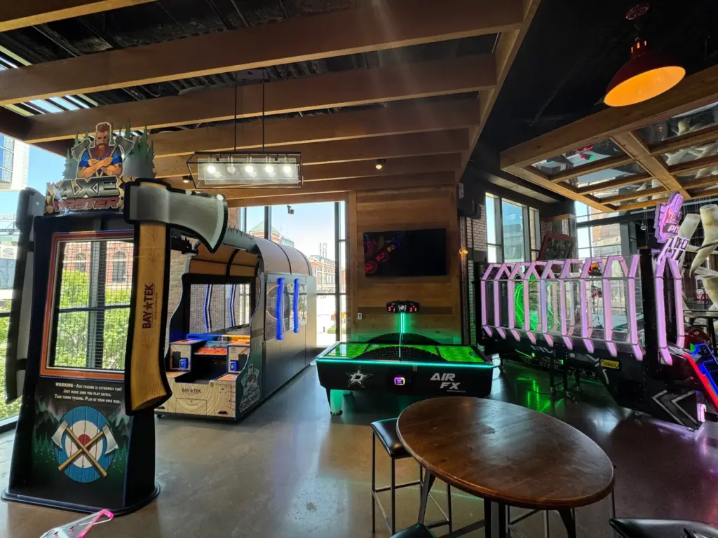 Air Hockey and Axe Master games in an upstairs bar.